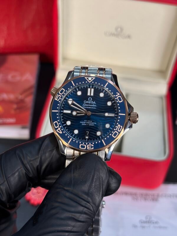 Omega Seamaster Diver 300M Co-Axial Master Chronometer – Two-Tone with Blue Ceramic Bezel and Copper Blue Dial - Image 4