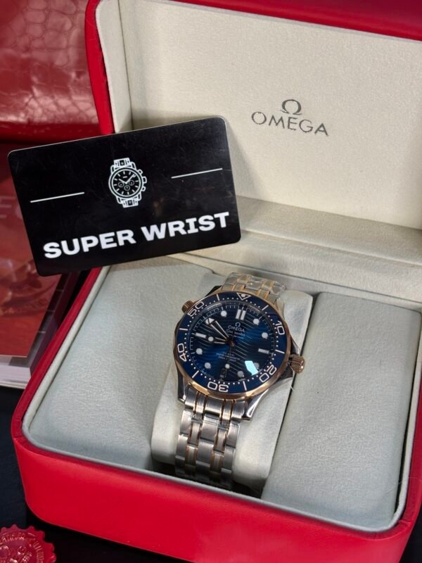 Omega Seamaster Diver 300M Co-Axial Master Chronometer – Two-Tone with Blue Ceramic Bezel and Copper Blue Dial - Image 2
