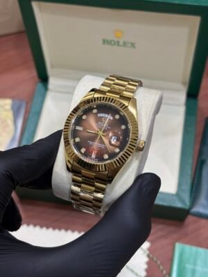ROLEX OYSTER PERPETUAL DAY DATE GOLDEN BROWN DIAL