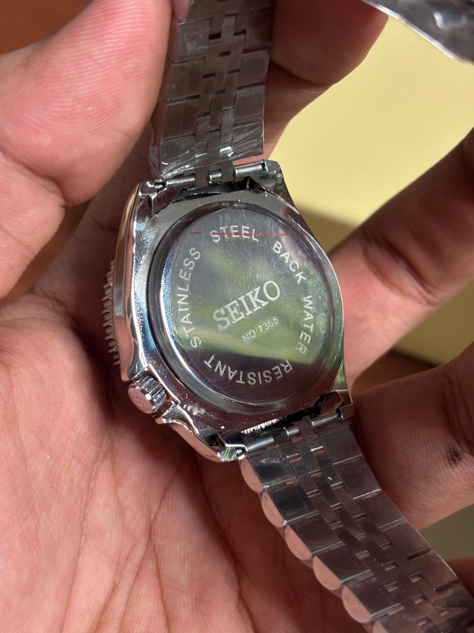 SEIKO GMT MASTER SILVER ORANGE DIAL - Image 5